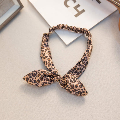 Big bow tie bunny ears headband in a playful design by My Store