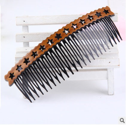Retro fashion hair comb with a classic design and textured detailing