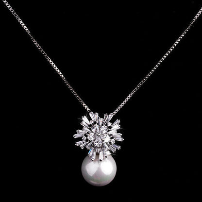 Pearl zircon necklace with elegant pearl and sparkling zircon pendant close-up