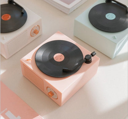 Retro vinyl wireless Bluetooth small sound speaker with vintage record player design and compact black finish