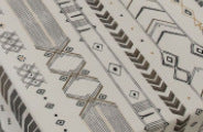 Boho cream cotton and linen print sun shade curtain fabric, non-punched textile close-up