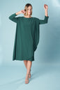 Ceylan Bcn lady multicolored dress with flowing fabric and stylish design, displayed on a hanger against a neutral background.