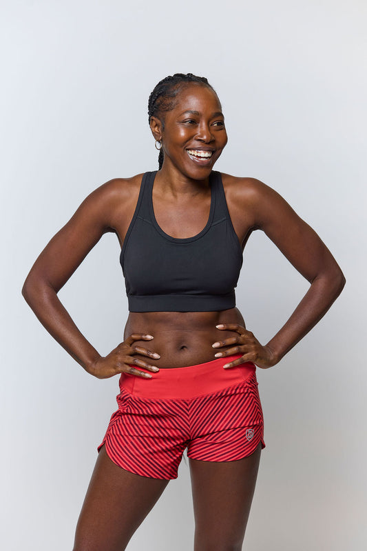 Goal Five 99'er Padded Sports Bra for training, with supportive padding and moisture-wicking fabric, shown on a model.