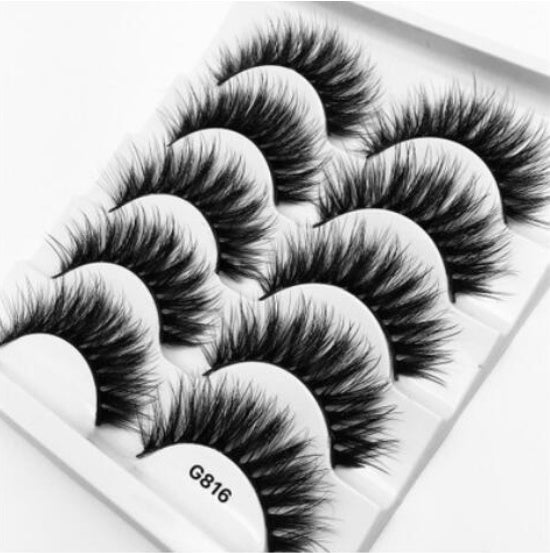 3D mink hair false eyelashes with soft, voluminous layered fibers on a clear lash band