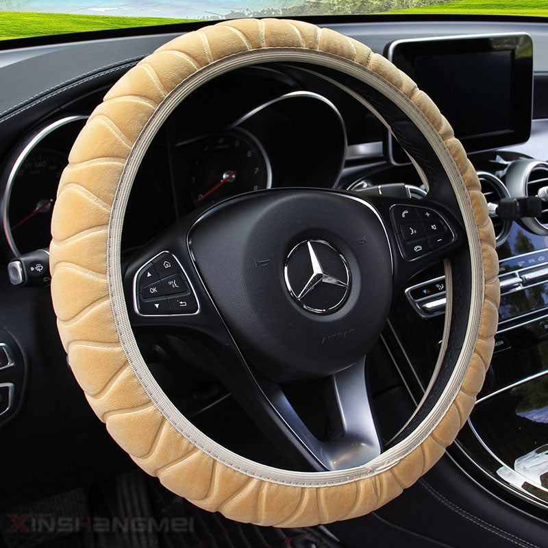 Plush car steering wheel cover in soft fabric, shown from the front