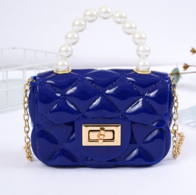 Pearl hand one-shoulder crossbody chain children's bag with a decorative pearl handle