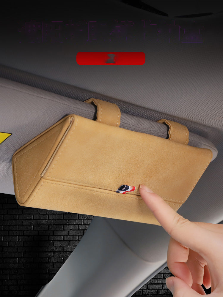 Car glasses storage box interior with hinged lid and compartments for organizing sunglasses and eyeglasses