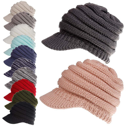 Women’s ponytail beanie, soft knitted autumn winter hat in warm black fabric with opening for ponytail