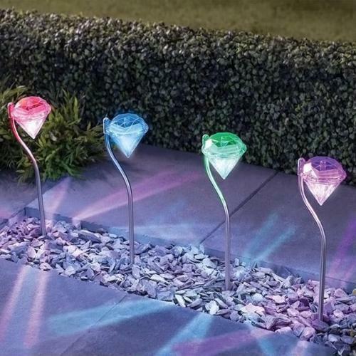 Solar powered garden diamond light with faceted crystal design for outdoor decor