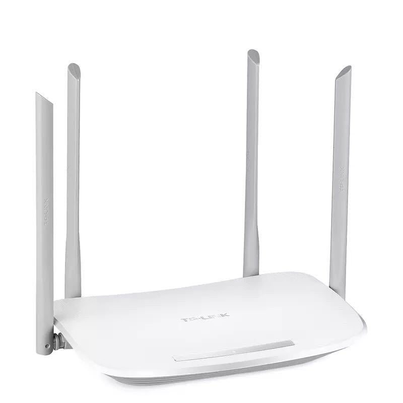 TP-LINK router wireless networking device on a plain background