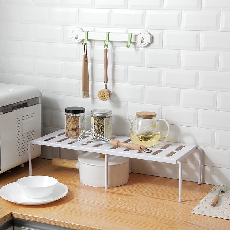 Telescopic kitchen rack for organizing kitchen supplies and utensils