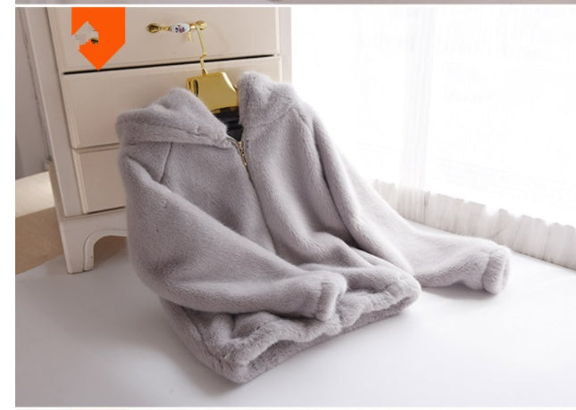 Women's faux fur mink coat in a plush, full-length design