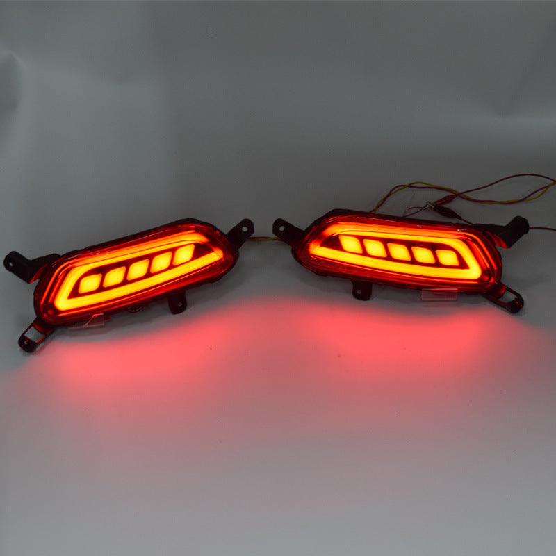 Car brake lights, rear automotive lighting assembly displayed against a plain background