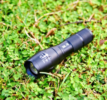 Black outdoor flashlight with durable handheld design and bright LED beam