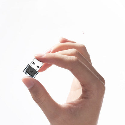USB-C to Lightning charger adapter, compact white design with USB-C connector and Lightning port