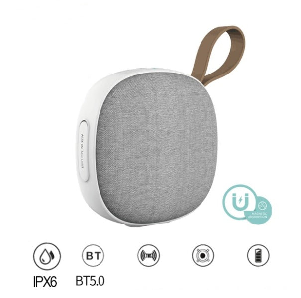Magnetic Bluetooth speaker in compact black design, featuring wireless audio and portable styling