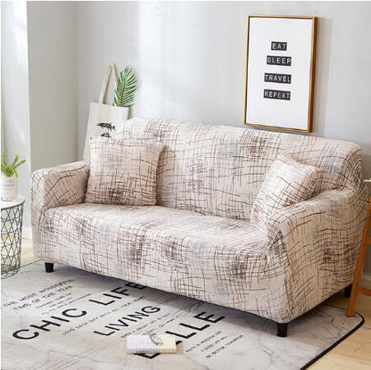 Elastic universal sofa cover in a neutral design, shown fitted over a sofa for a smooth, protective fit