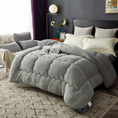 Cashmere blanket in soft, neutral fabric with a smooth woven texture