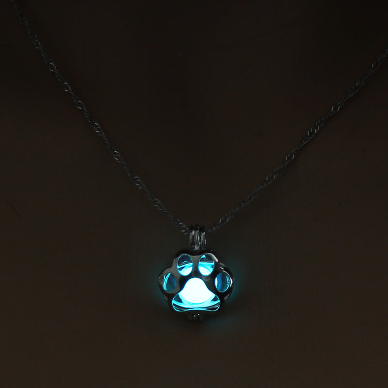 Animal night light necklace with glowing animal pendant, close-up product view