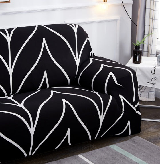 Elastic universal sofa cover in stretch fabric, shown fitted over a sofa frame