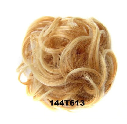 Gold hair ring accessory, close-up view