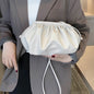 Black and white PU leather clutch handbag with shoulder strap, stylish women’s crossbody bag by Feelontop Jewellery.