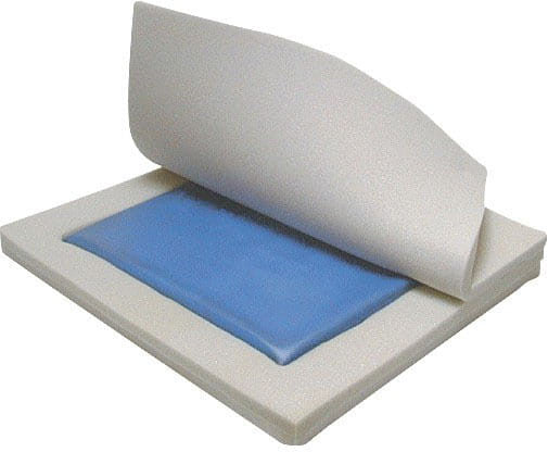 Molded wheelchair cushion with gel and foam, 18x16x2 inches, designed for comfort and support in wheelchair seating.
