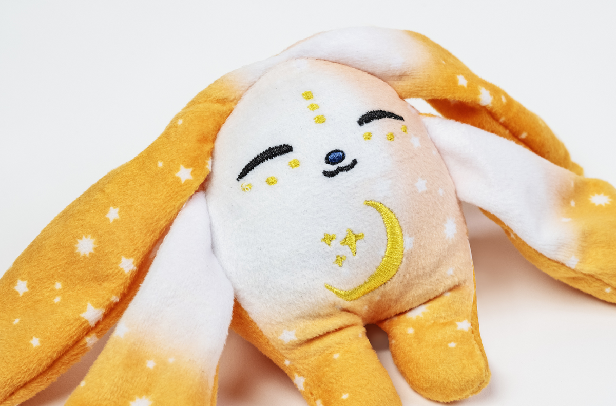 Moon Pals Ori Mini Wrist Hugger Plush, soft and cuddly wrist accessory featuring a cute plush design.