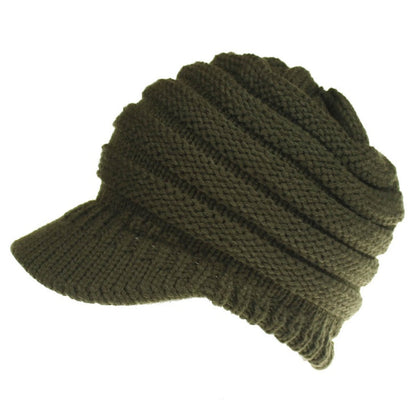 Women’s ponytail beanie, soft knitted autumn winter hat with warm skullcap design, shown in a neutral color