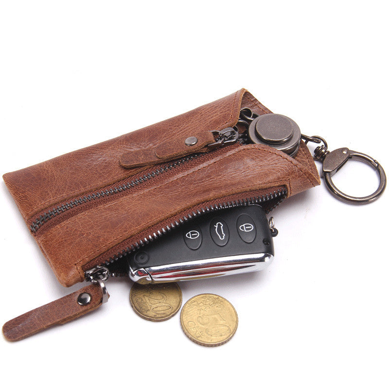 Leather car key bag, compact accessory with secure zip closure and key ring for everyday carrying