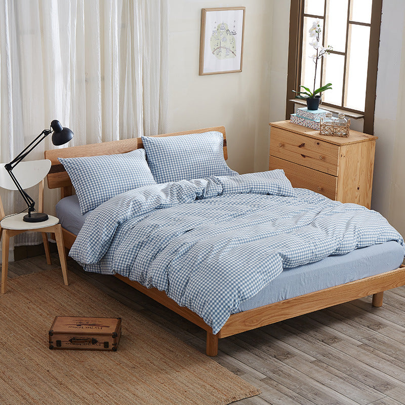 Pure cotton four-piece bed sheet set with soft fabric and coordinated bedding pieces
