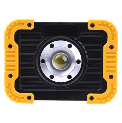 Rechargeable LED camping lantern emitting bright light for outdoor camping use