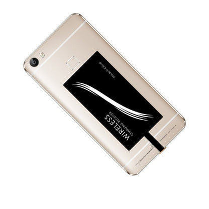 Wireless charger receiver compatible with Qi-enabled devices, shown as a slim charging adapter.