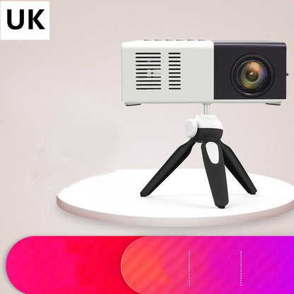 Handheld mini LED home entertainment projector for gifts, compact design with lens and control buttons