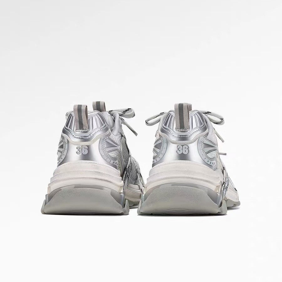 Silver designer dad-style athletic casual shoes with chunky sole and lace-up design