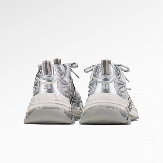 Silver designer dad-style athletic casual shoes with chunky sole and lace-up design