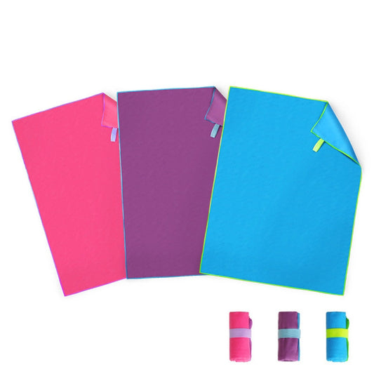 Microfiber double-sided fleece quick-drying portable swimming towel with strap folded neatly and ready for travel