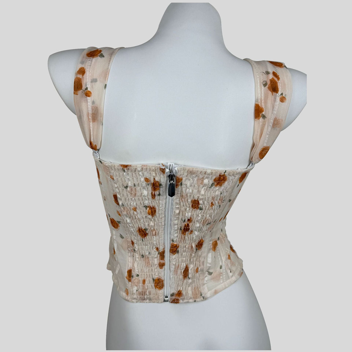Apricot lace-trimmed underbust corset with slimming fit and spaghetti straps