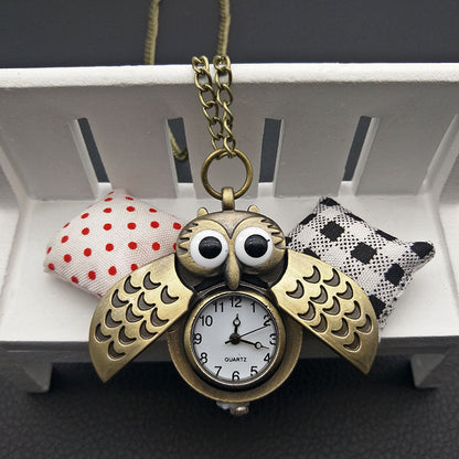 Owl pocket watch with detailed owl design and classic vintage-style casing