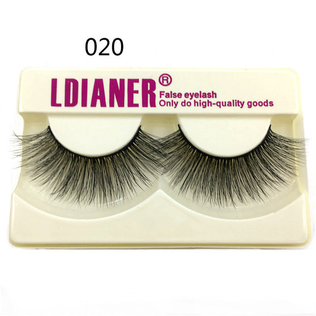 25mm wispy fluffy mink fake eyelashes with a soft, voluminous lash style in a curved strip tray