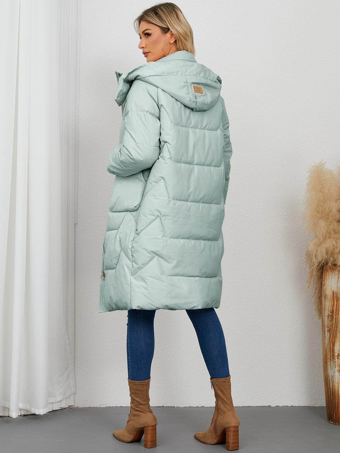 Long sleeve longline hooded winter coat for women in neutral color, featuring a cozy, stylish design from Trendsi.