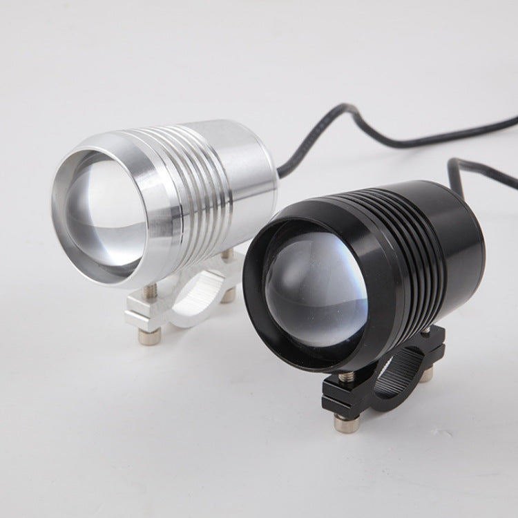 Super bright electric car headlights, front view detailing headlight design and bright beam pattern