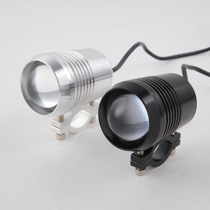Super bright electric car headlights, front view detailing headlight design and bright beam pattern