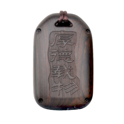 Sandalwood key case in a compact wooden design with a smooth, natural finish