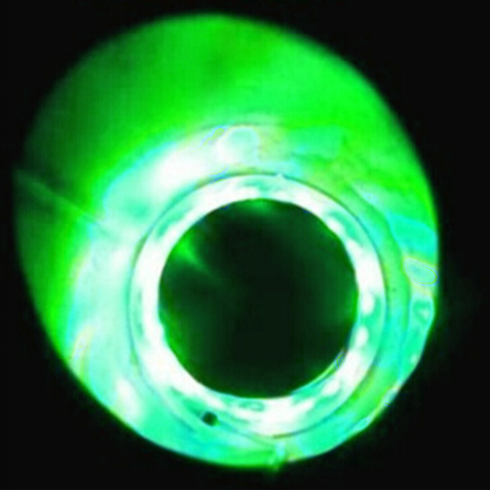 Motorcycle modified exhaust lamp with sleek metal housing and visible exhaust-style design