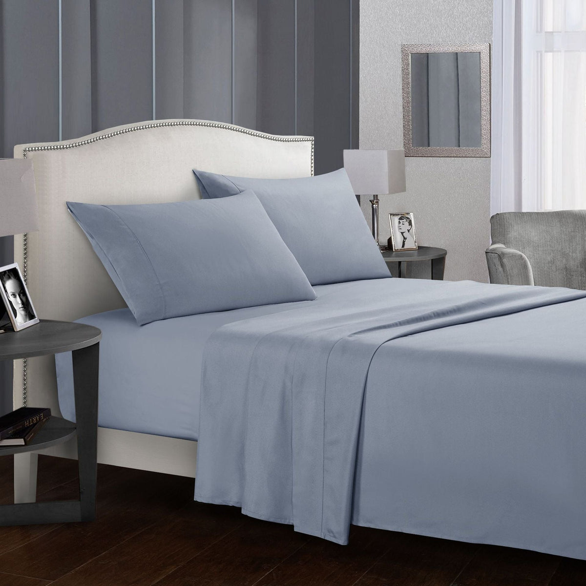 Four-piece bed sheet set by My Store, showing coordinated sheets and pillowcases in a neatly arranged stack