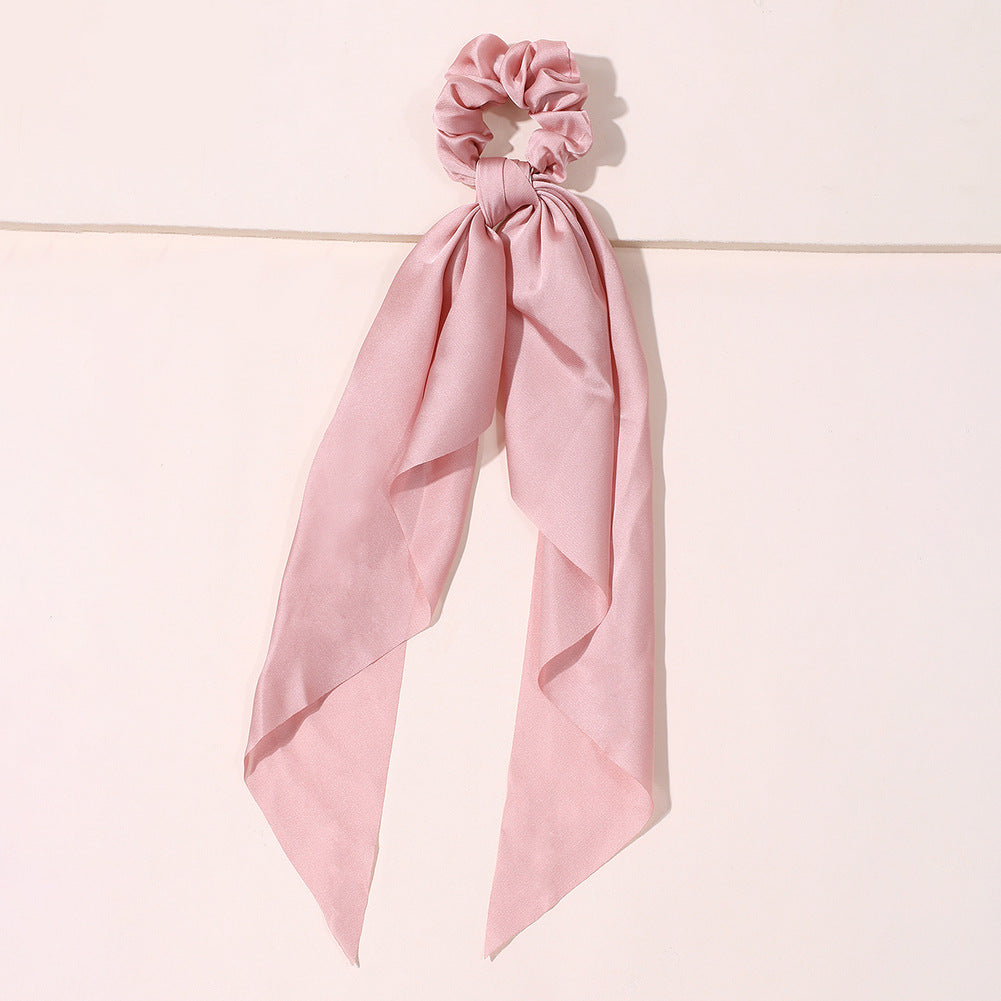 Cute scrunchies pack and headband for women in assorted colors, displayed together