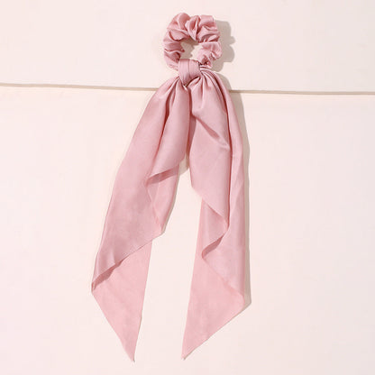 Cute scrunchies pack and headband for women in assorted colors, displayed together