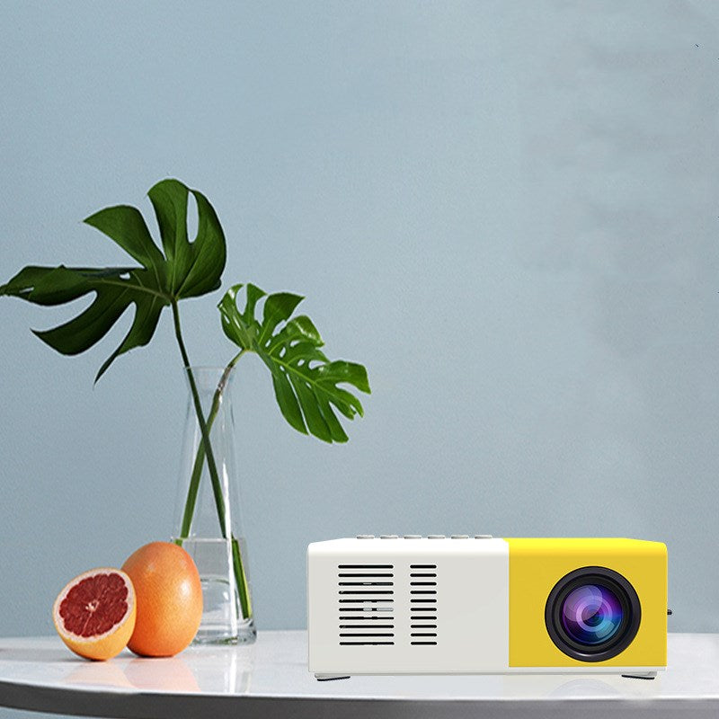Handheld mini LED home entertainment projector by My Store, compact design for projecting videos and images