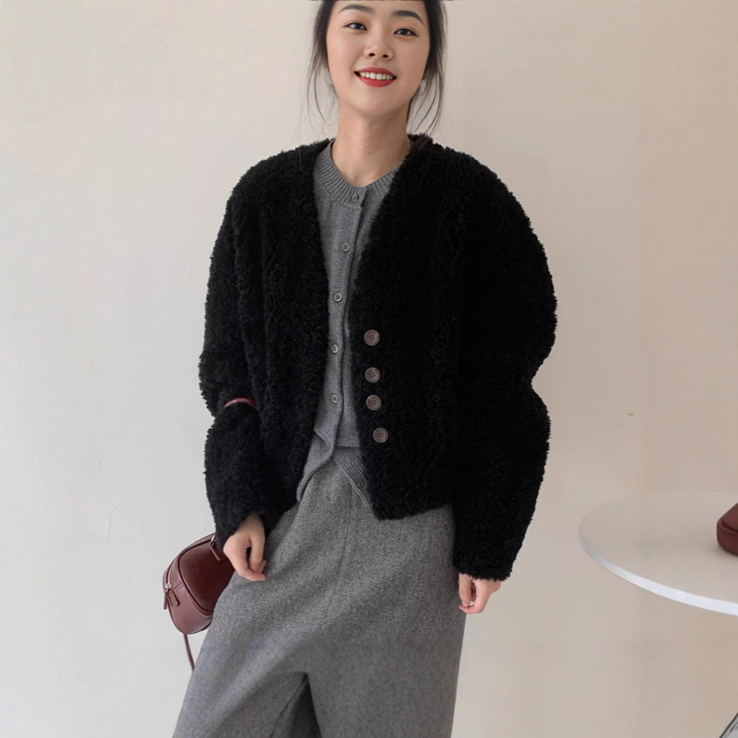 Women's V-neck short loose padded lambswool coat in a relaxed fit, front view